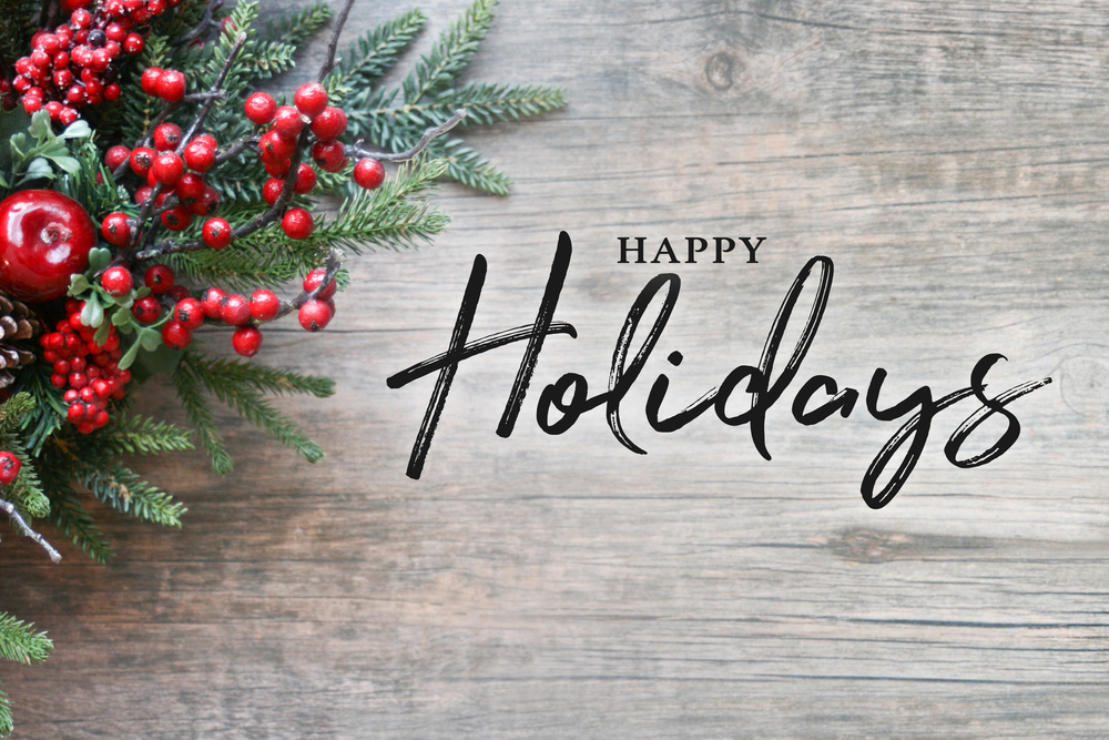 happy holidays on wood background