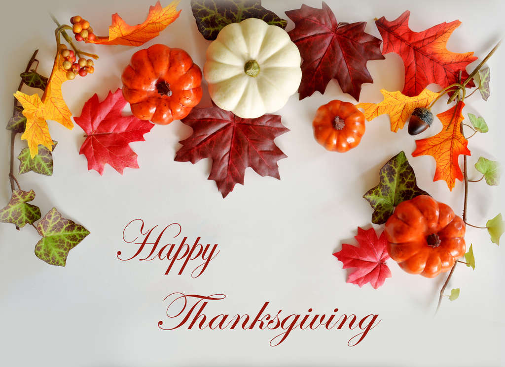 happy thanksgiving with leaves and pumpkins